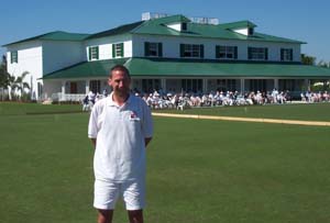 me Photo of John Moore standing in front of the club house at the National Croquet Center in Florida.