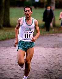 Photo of John Moore in his Heaton Harriers vest towards the end of a 10km race.