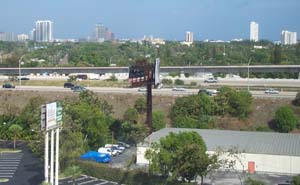 window view View from hotel window, showing a car park, a highway and, in the distance, the centre of West Palm Beach.